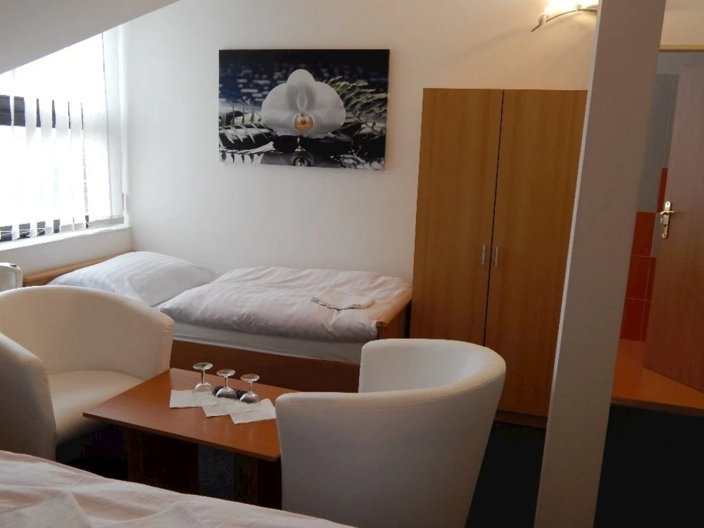 Třílůžkový pokoj