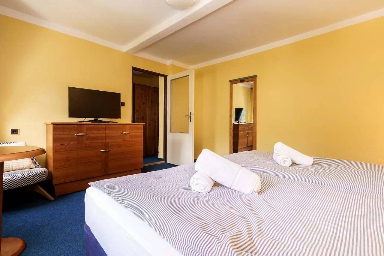 Třílůžkový pokoj